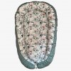 babynest gekleurd groen / roze jungle