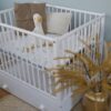 Boxkleed 95x75 cm in een babybox, passend en zacht op maat gemaakt